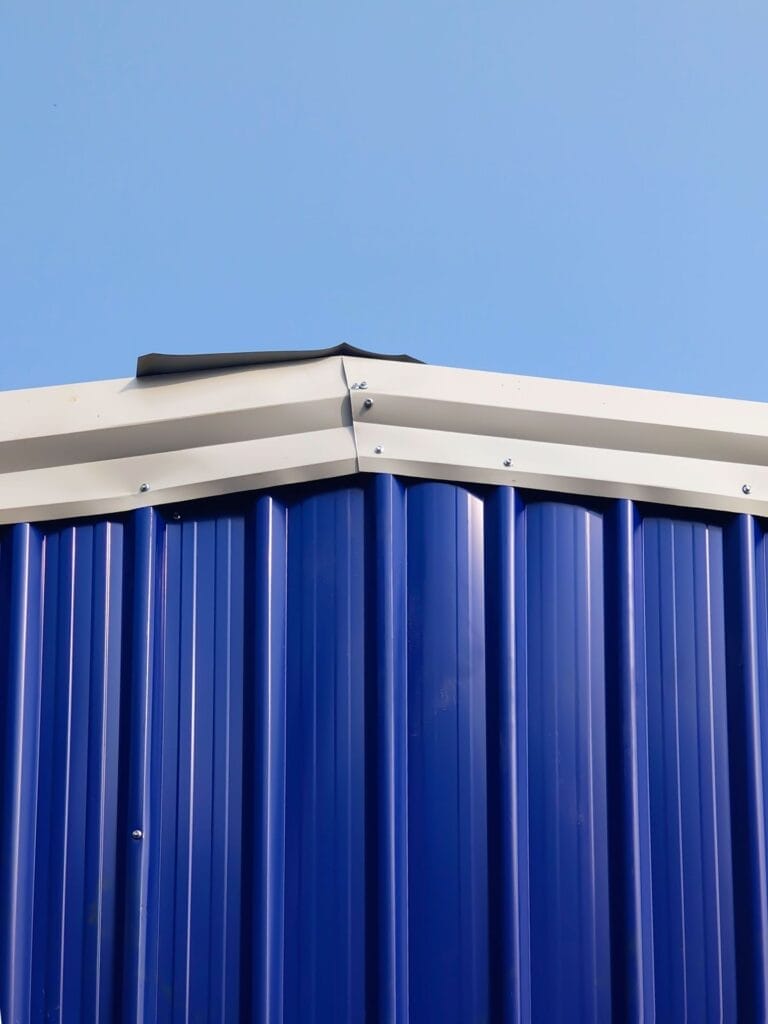 Commercial building roof edge and metal panels